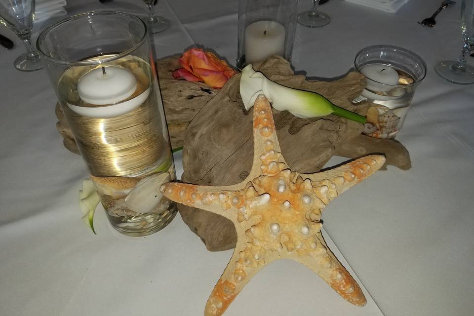 Star fish, drift wood and candles