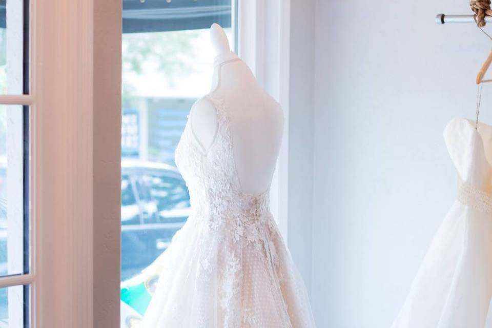 The wedding dress window display | Compliments of Tori Shelstad photography