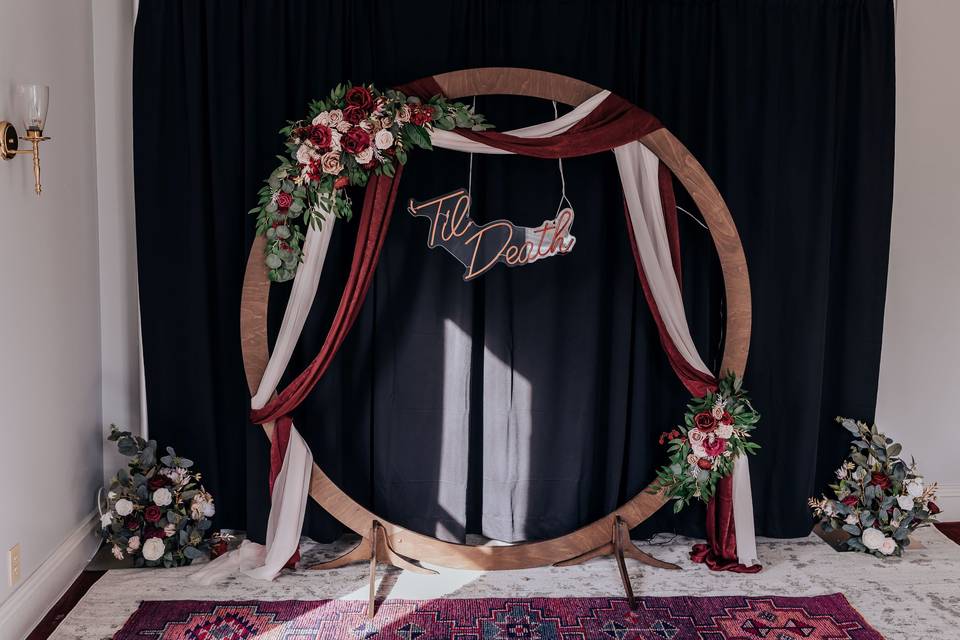 Wedding arch with neon sign