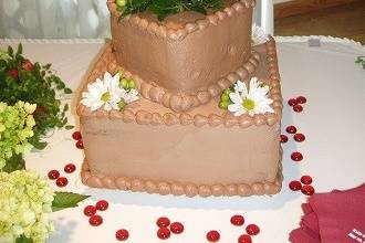 Cake flowers of white daisies and greens by Loeffler's Flowers