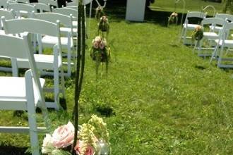 Ceremony aisle orb with roses and greens by Loeffler's Flowers