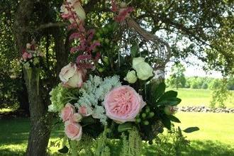 Ceremony - decorated bird floral bird cage by Loeffler's Flowers