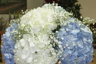 Reception flowers - white and blue hydrangeas centerpiece by Loeffler's Flowers