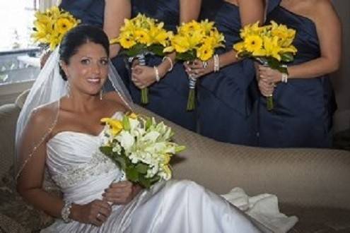 Bridal and attendant Bouquets of lilies, calla lilies and gerbera daisy by Loeffler's Flowers