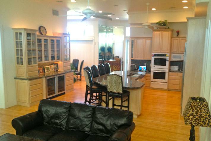 The gourmet kitchen, dining, and living area.
