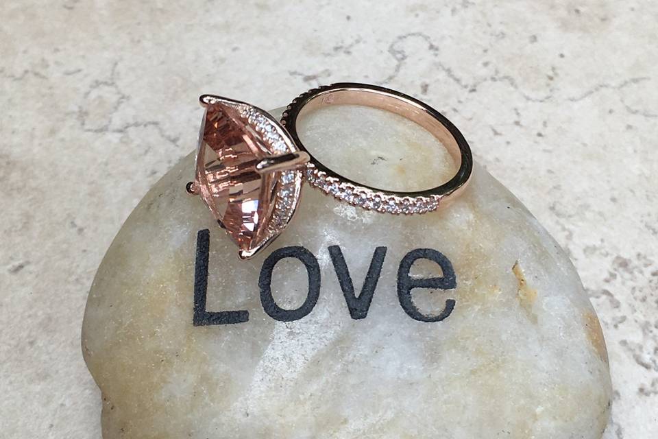 LS4595 Seen here is our stunning Morganite Solitaire Engagement Ring with a basket of diamonds.  Every gem is handset in Rose Gold.
See full details here:
https://www.lauriesarahdesigns.com/product/morganite-engagement-ring-solitaire-diamond-side-halo/