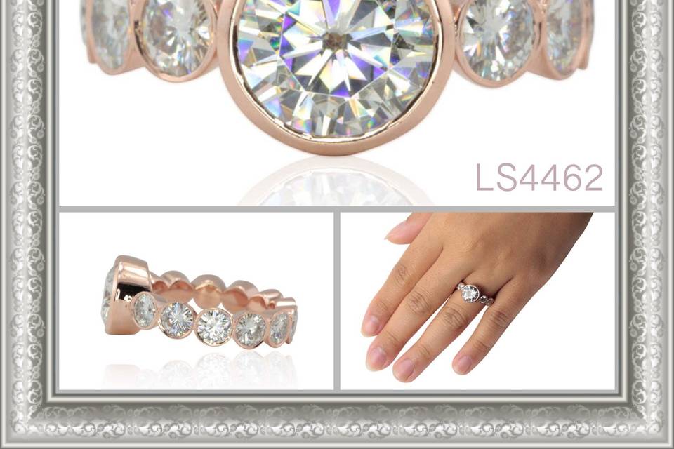 A stunning moissanite and rose gold engagement ring! LS4462
See full details here:
https://www.lauriesarahdesigns.com/product/moissanite-engagement-ring-rose-gold-eternity-bezel-shank/