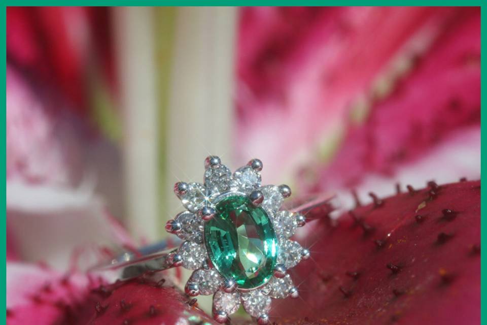 Here we have a gorgeous Coumbian Emerald engagement ring with a beautiful diamond halo.
See full details here:
https://www.lauriesarahdesigns.com/product/colombian-emerald-and-diamond-ring-with-flower-halo%C2%97-ls192/
