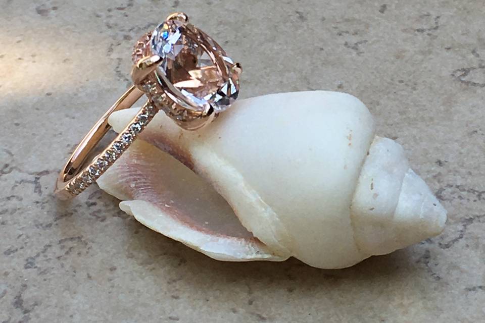 A stunning morganite ring with a white sapphire side halo, all set in rose gold
See full details here:
https://www.lauriesarahdesigns.com/product/morganite-engagement-ring-white-sapphire-side-halo-rose-gold/