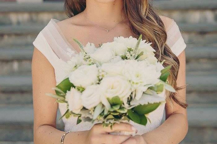 Bride holding up her drink