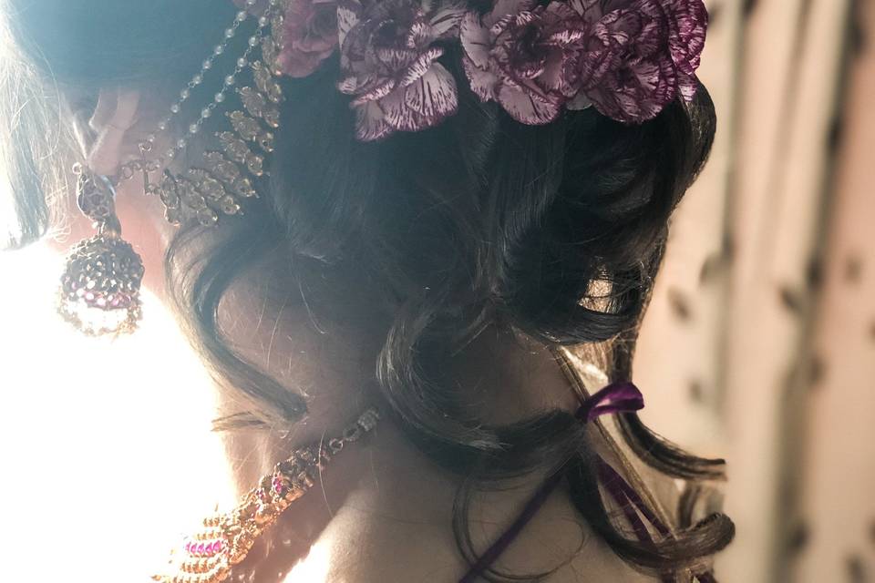 Romantic updo embellished with flowers