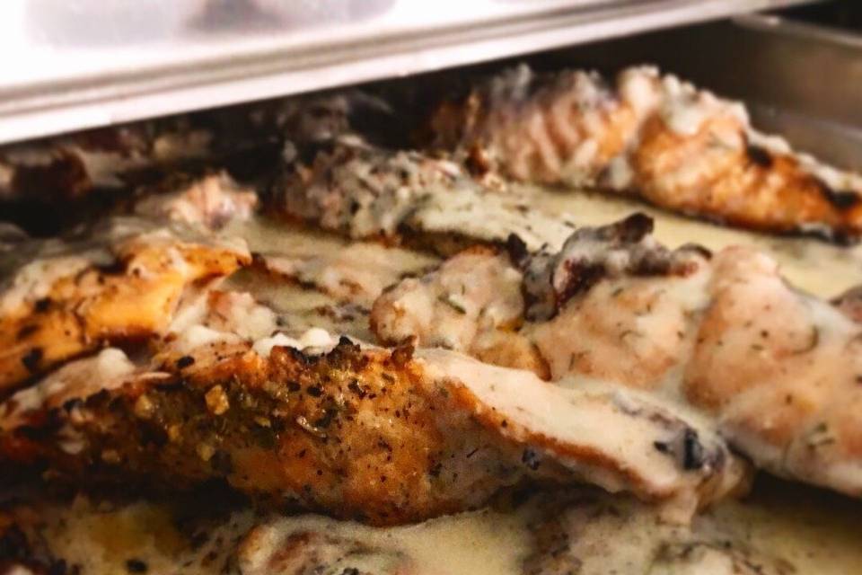 Grilled salmon: served with a lemon dill beurre-blanc