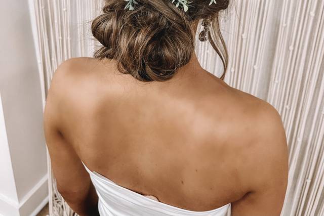 Low bun updo with floral