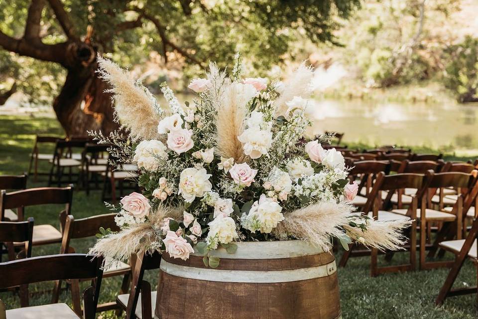 Outdoor wedding aisle by the r