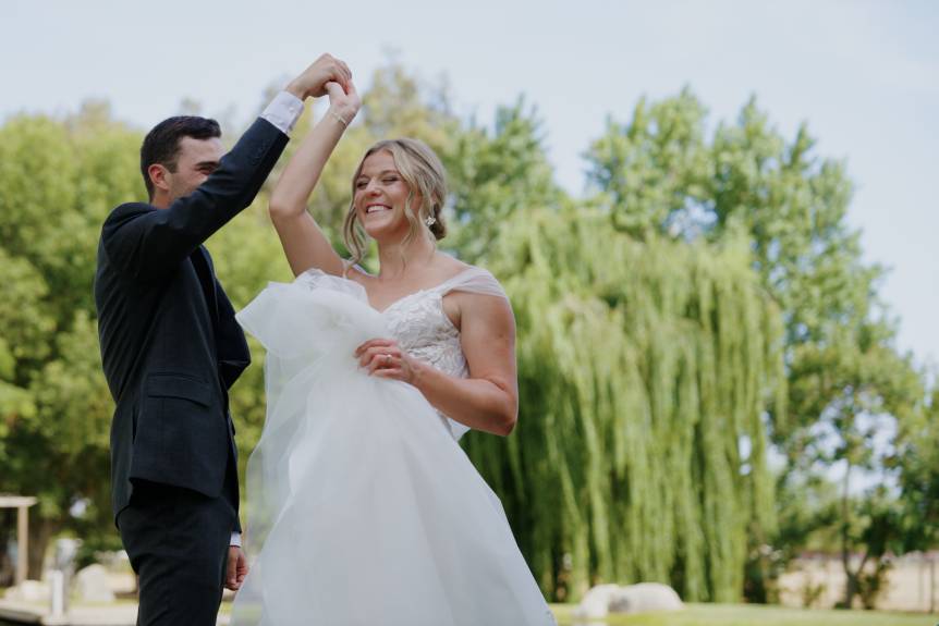 Aisle twirl from bride and gro