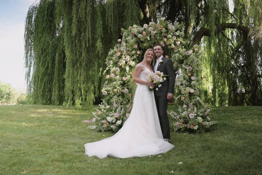 Outdoor wedding by willow pond