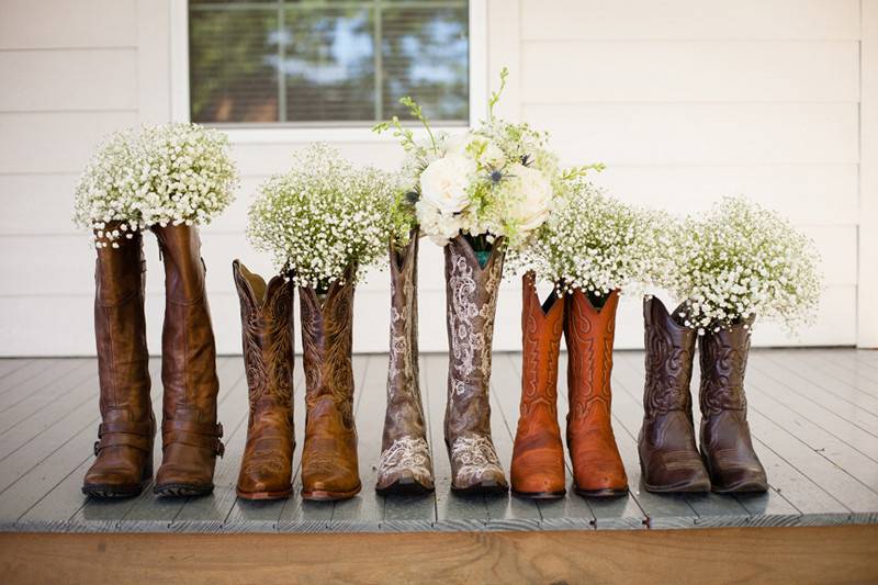 A pair of fall inspired floral arrangements for the front doors of the church.  These include roses, berries, dahlias, interesting foliage and a fine silk ribbon in the bride's colors.