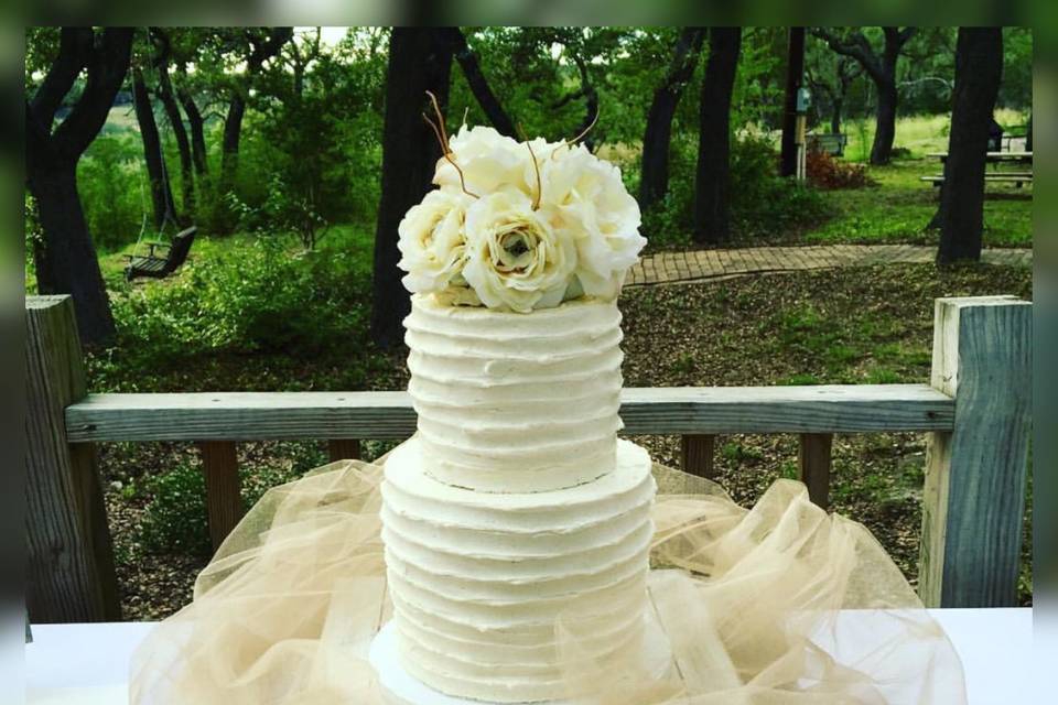 Simple buttercream cake with flowers