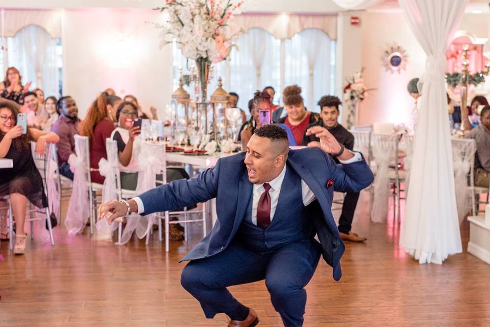 Groomsman dancing