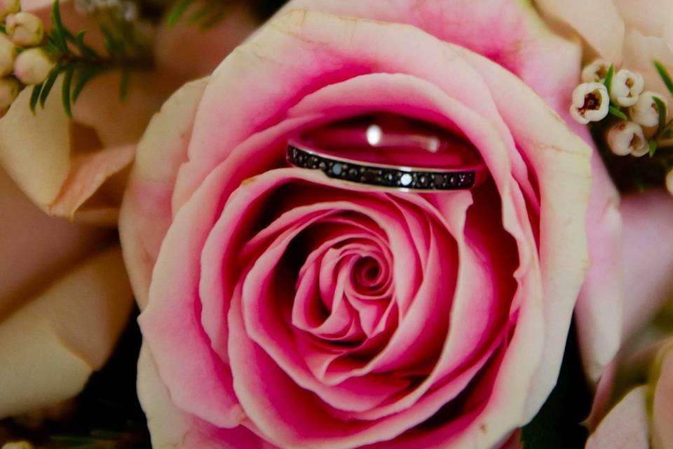 Wedding ring on flowers