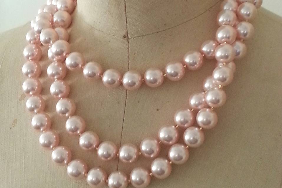 Marinella jewelry signature layered necklace. Pale pink rose  Swarovski crystal pearls with silver-tone clasp. Triple layered. Wear beyond your gown!