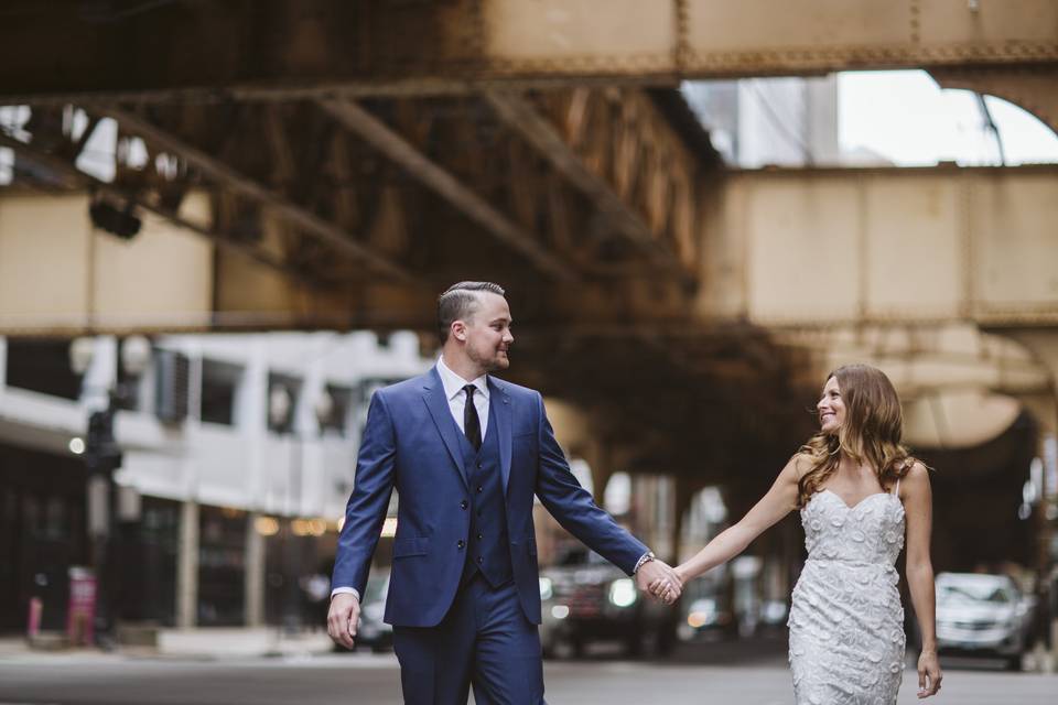 Holding hands and smiling - Rebecca Peplinski Photography