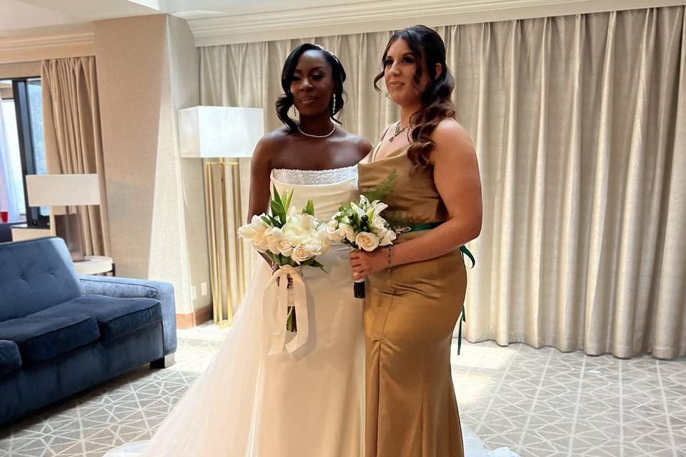 Bridesmaid and bride