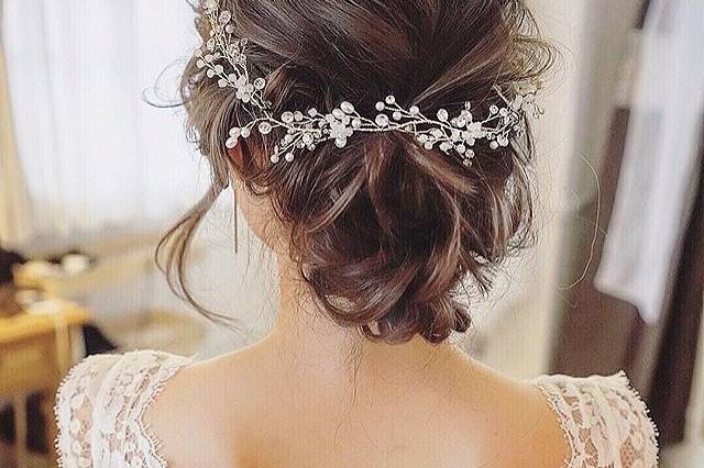 Updo and floral headpiece