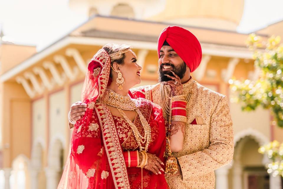 Indian couple by a temple