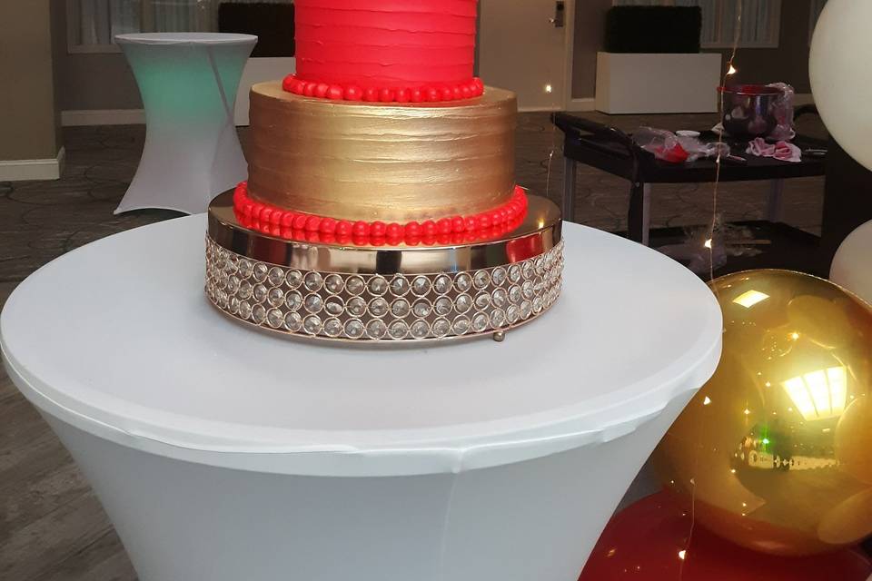 Red and gold wedding cake