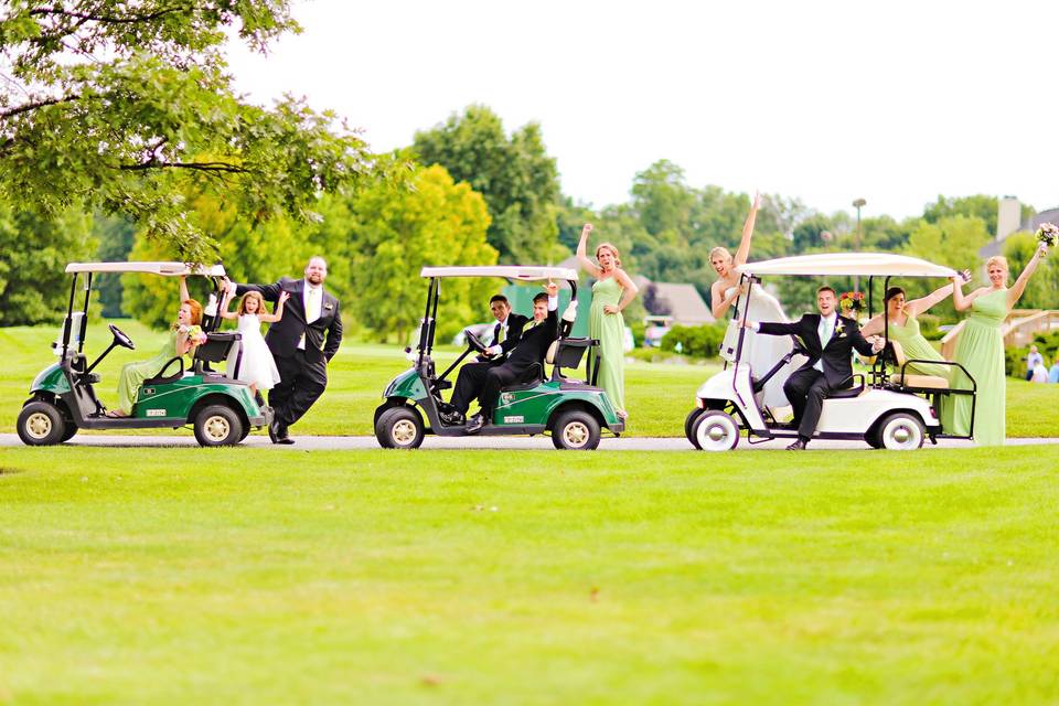 The couple together with their bridesmaids and groomsmen