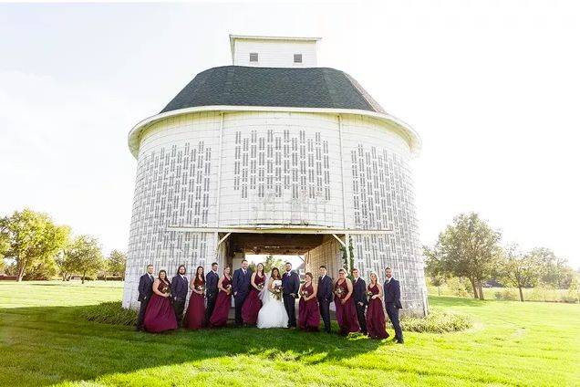 The couple together with their bridesmaids and groomsmen