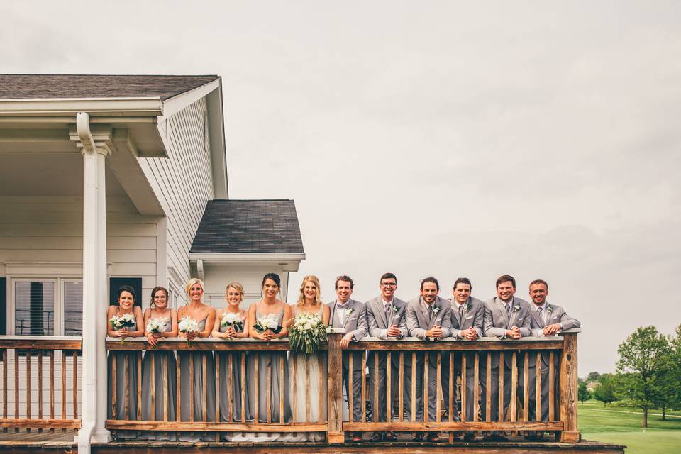 The couple with the bridesmaids and groomsmen