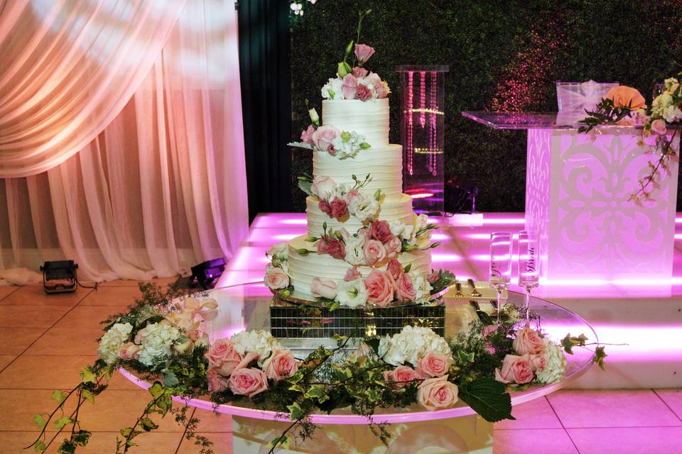 Cake table with pink flowers