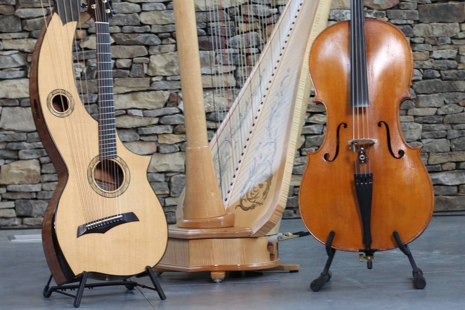 Two guitars and a harp