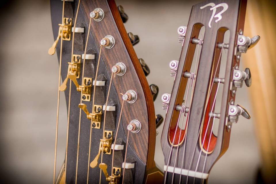 Two guitars and a harp