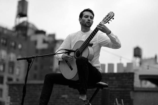 Performing at a rooftop wedding in NYC.