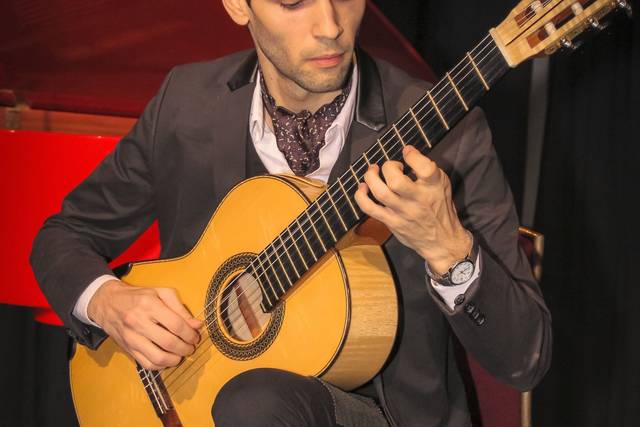 Performing at Royal Albert Hall, London.