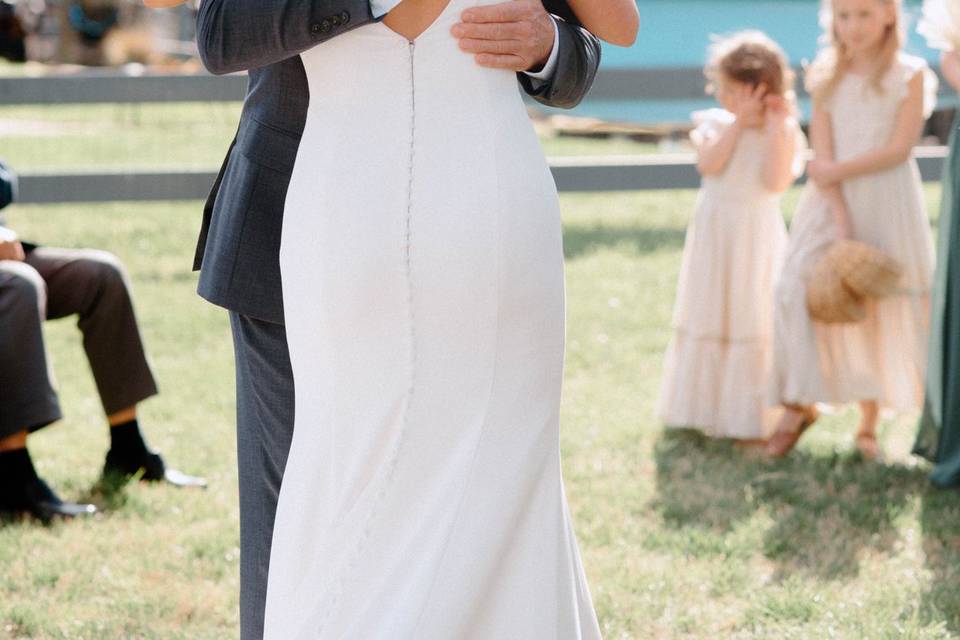 Bride hugging Father