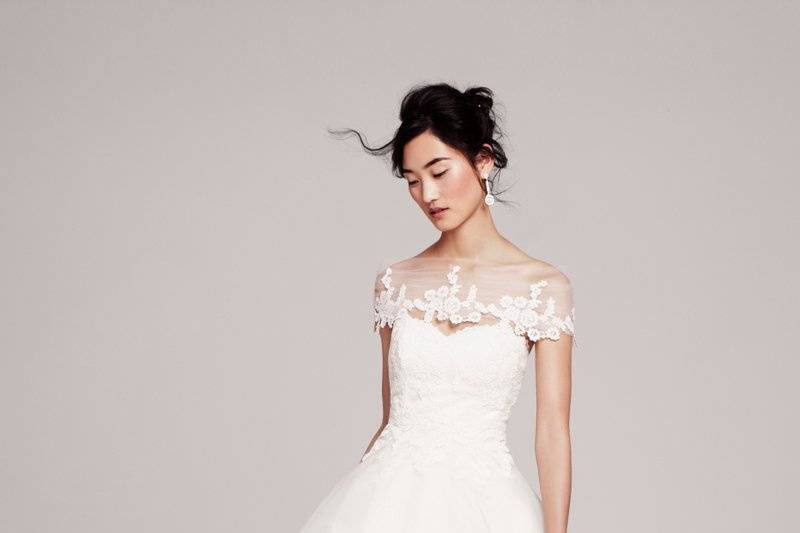Mila- Strapless Hayley Paige ivory bridal ball gown with lace sweetheart neckline bodice and silk organza tiered flouncy skirt with chapel train.