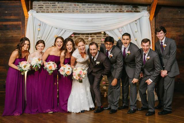 The couple with the bridesmaids and groomsmen