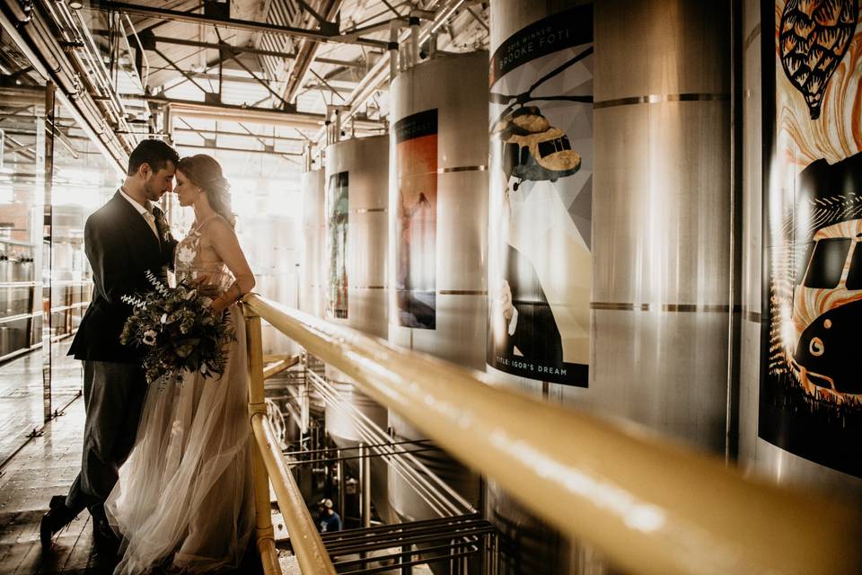 Bride & groom in factory