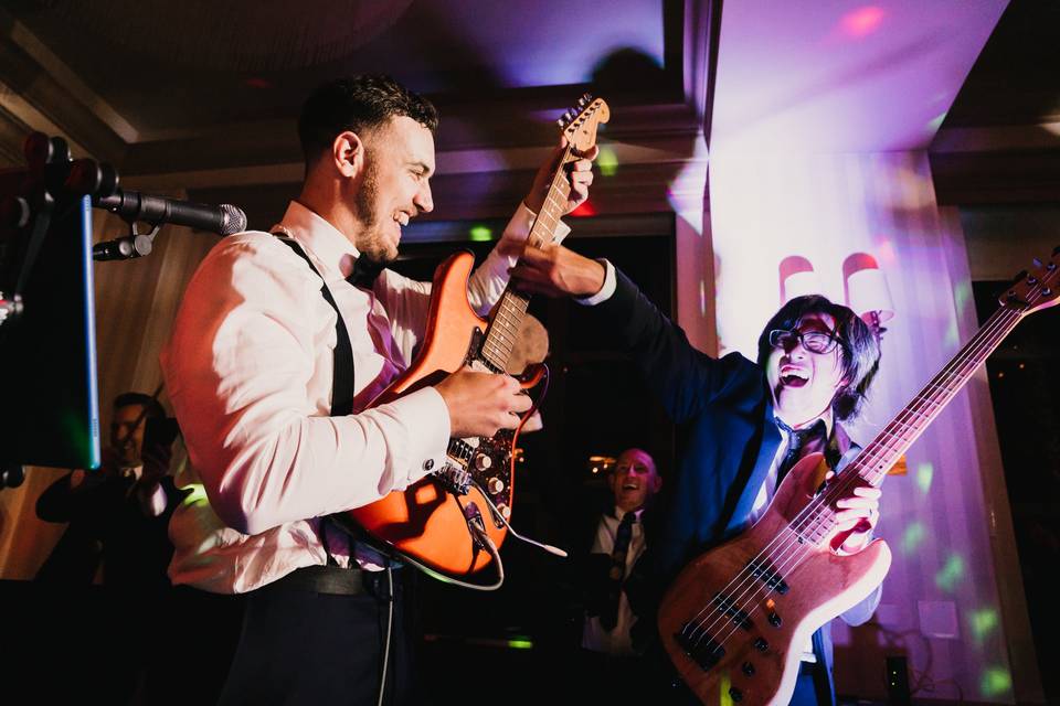 Guitar cameo from the groom!