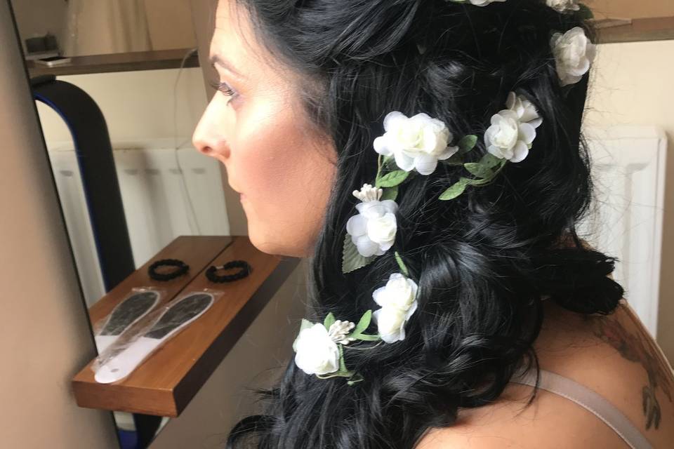Flowers on bridal hairdo