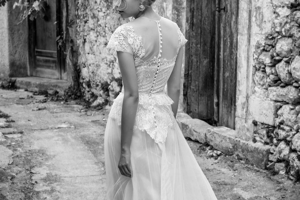 Look 22 Anthousai - Illusion lace corseted gown with peplum & full tulle skirt