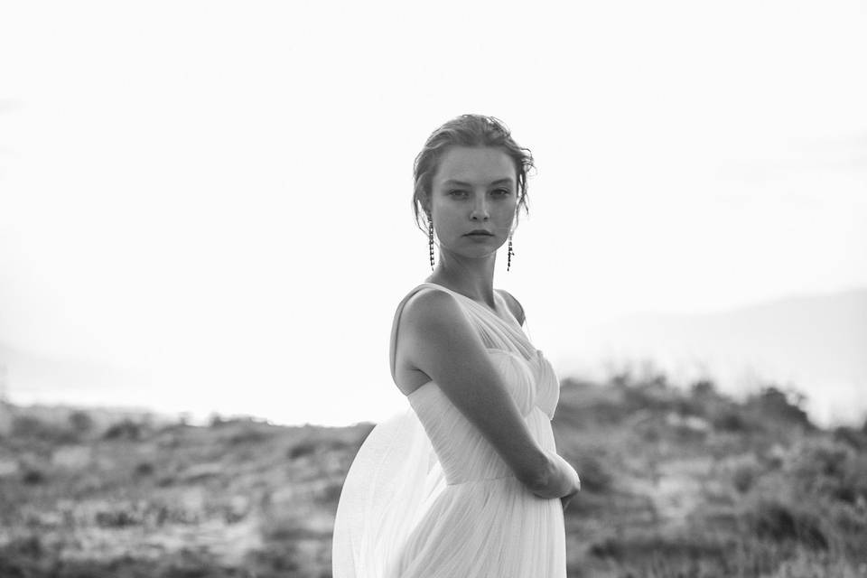 Look 27 Thero - Delicate mircopleated soft silk tulle gown with draped cape & diamante belt