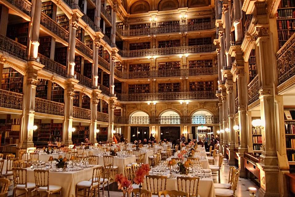 Cocktail hour and wedding reception at the George Peabody Library in Baltimore MD.
