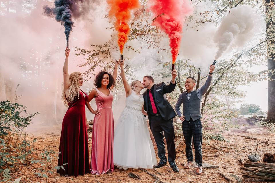 Wedding party with smoke bombs