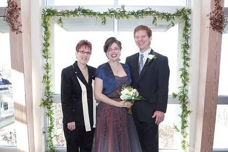 Newlyweds and the officiant