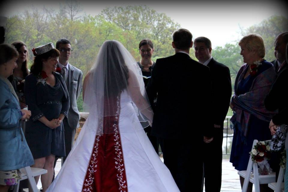 Bride being escorted to her groom